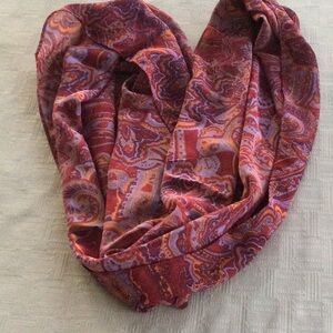 Women’s red, orange & lavender infinity scarf.